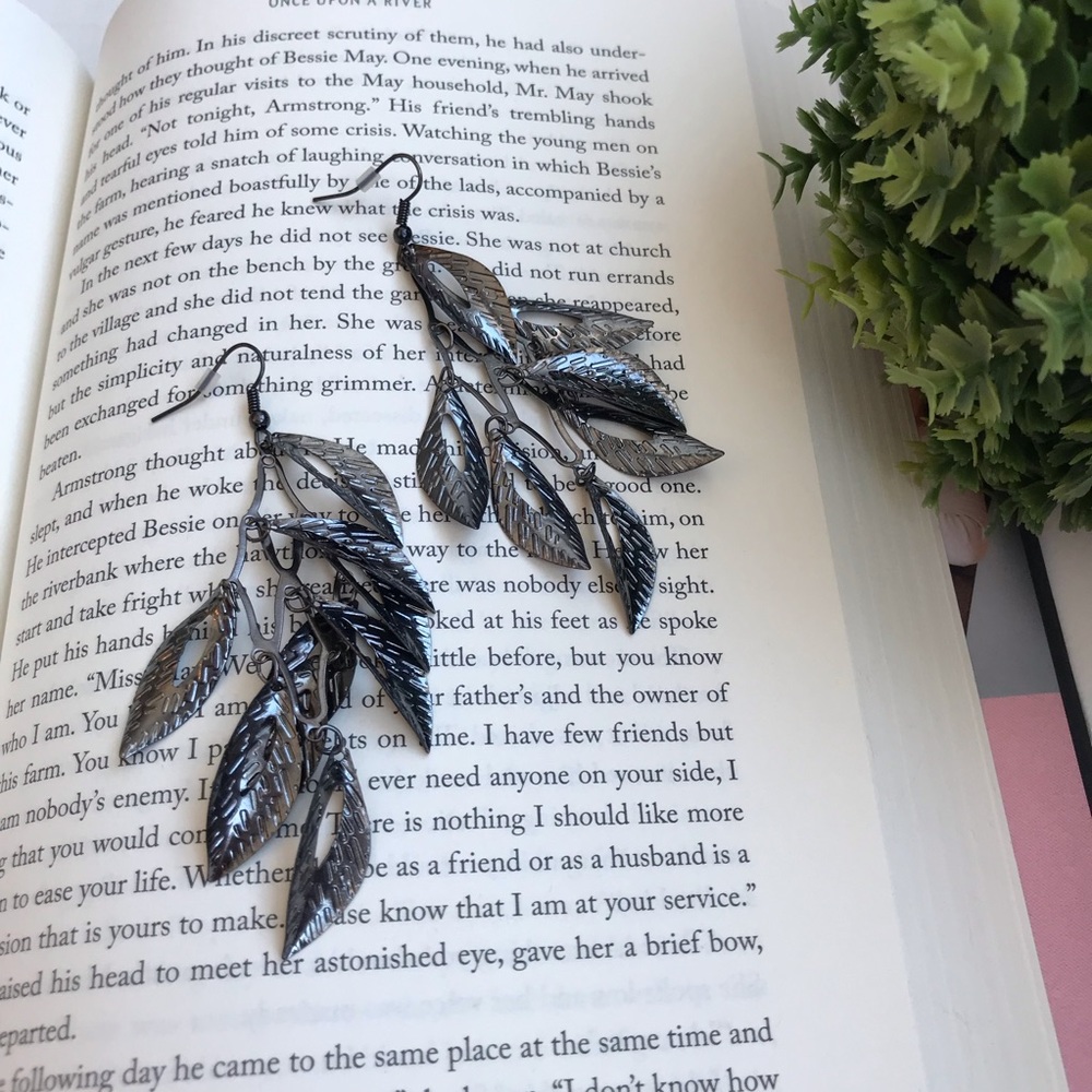 Silver feather dangle earrings